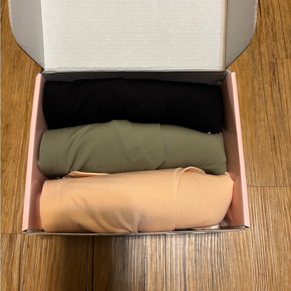 Set of Three bras - Black, Olive, Peach. Mailed by mistake from Amazon.